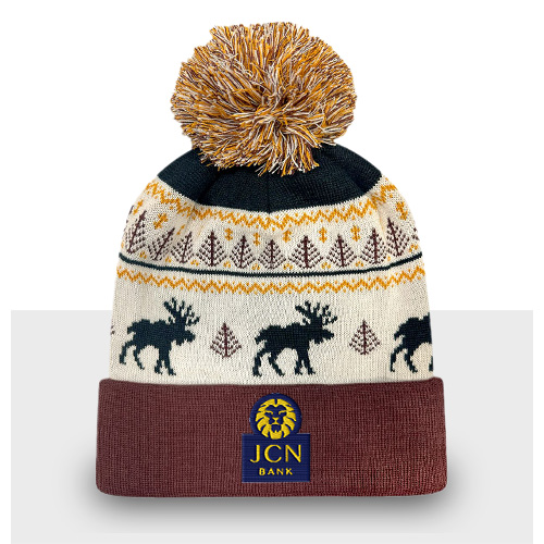 Pom beanie with festive fun woven design including moose silhouettes and trees