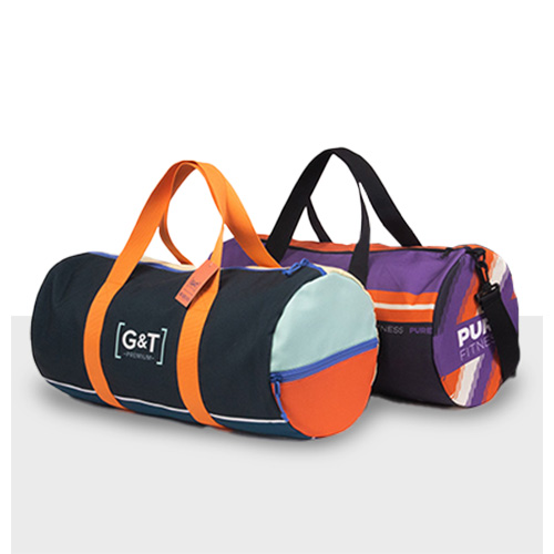 Two full color canvas duffel bags with logo